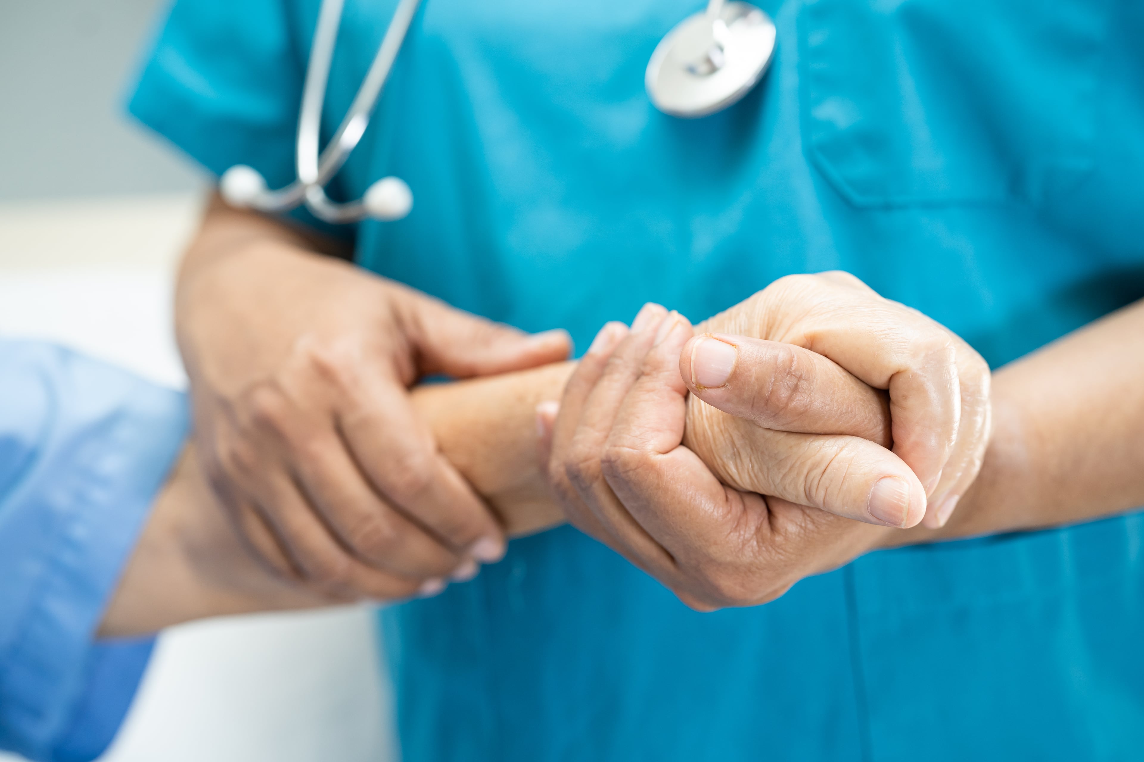 Supportive care professional helping a client