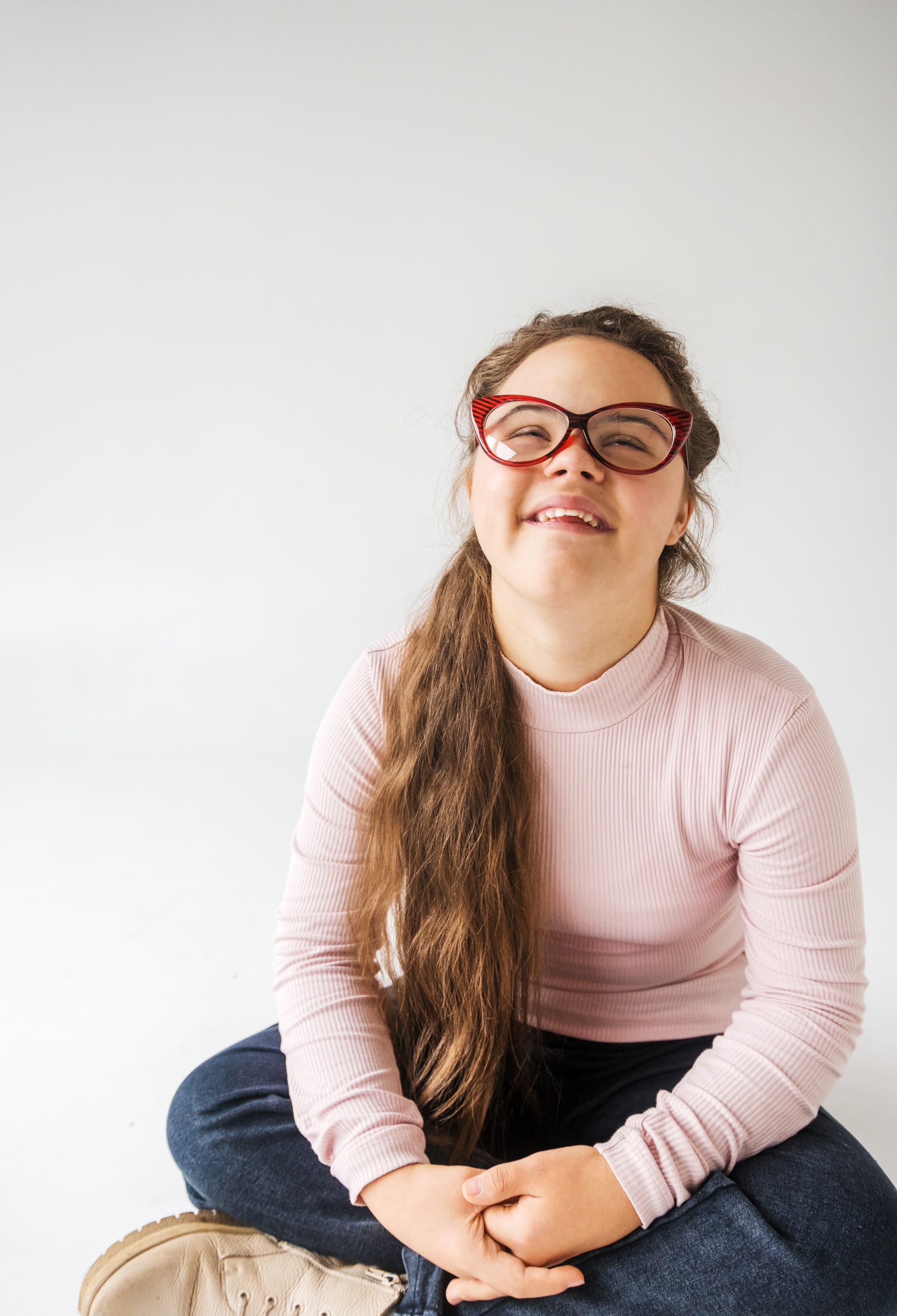 Young woman with Down syndrome participating in activities